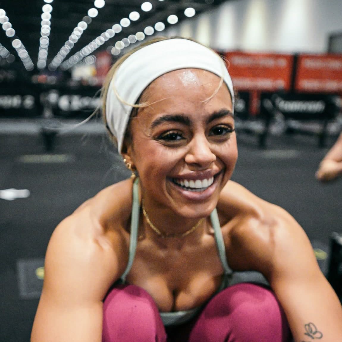 Debbie Millyard smiling mid-row